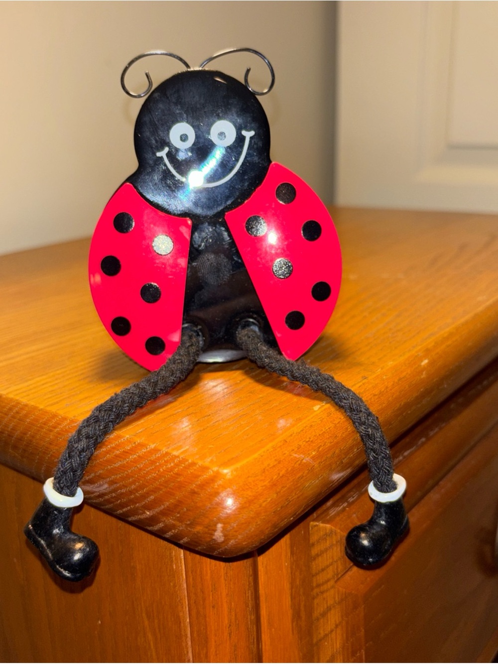 Lady bug shelf sitter